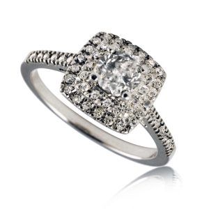 Anillo de compromiso con circonia cuadrada y halo de circonias