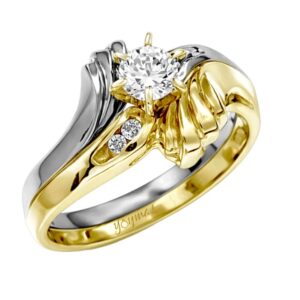 Anillo jacket de compromiso con laterales encontrados y circonias oro 10k
