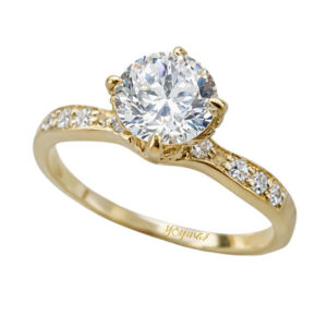 Anillo de compromiso con montura de flor con circonias en oro 10K