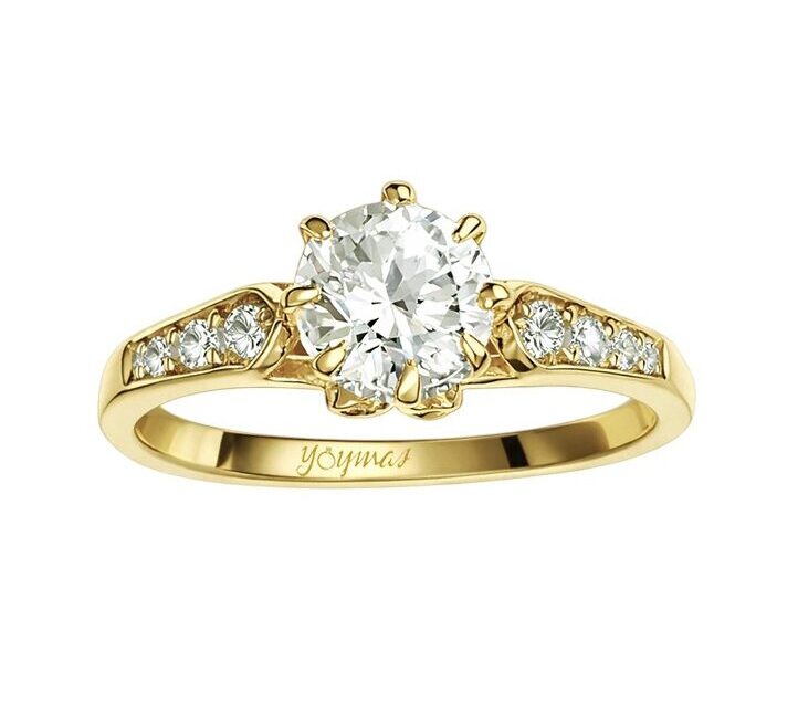 Anillo de compromiso montura simulación de flor con circonias 10K