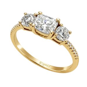 Anillo de compromiso con circonia rectangular central y circonias oro 10K