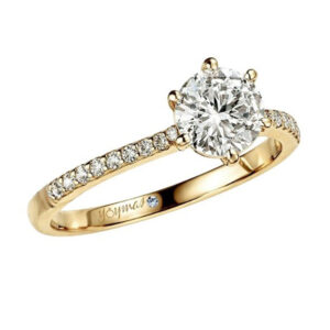 Anillo de compromiso con circonia y circonias a los laterales oro 10K