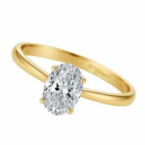 Anillo de compromiso con circonia ovalada central oro 10K
