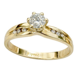 Anillo con circonias laterales cruzados oro 10K