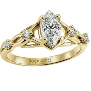 Anillo con circonia marquesa y circonias a los lados oro 10K