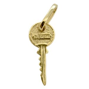 Dije en forma de llave oro 10K